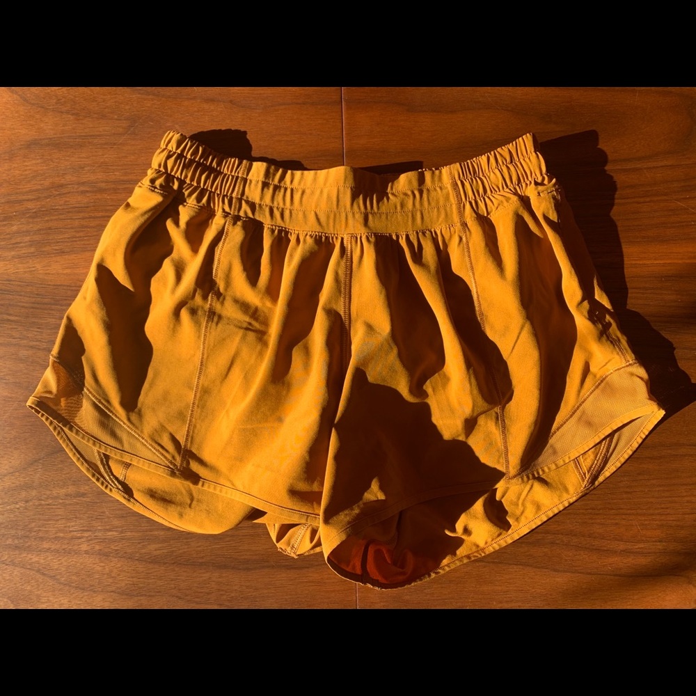 Yellow-orange/gold lululemon shorts